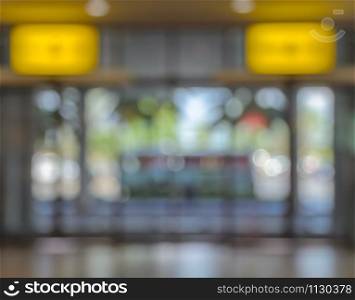 Defocused image of office, airport, hospital or shopping mall building door background