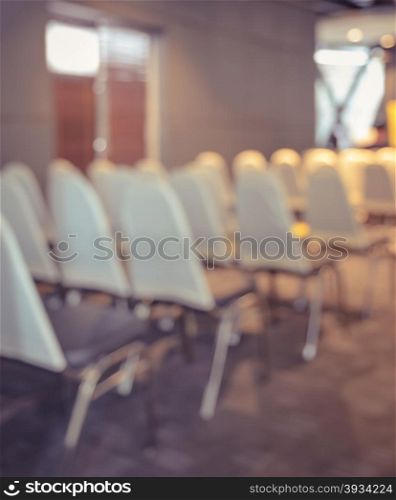 Defocused meeting room background. Vintage filter effect