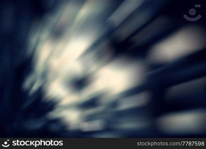 Defocused motion blur spots of light fly on black background.. Defocused motion blur spots of light fly on black.