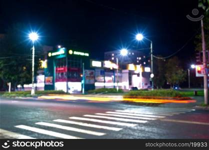 Defocused photo of night city background. night city