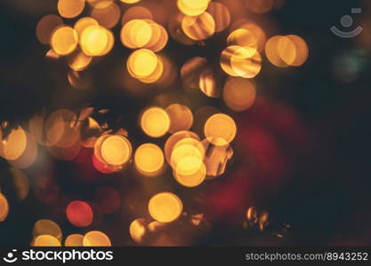 defocused shiny garland lights, winter holiday greeting card, background. background defocused shiny garland lights