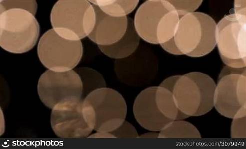Defocused yellow holidays lights background. Dolly shot at 60fps.