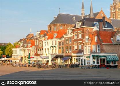 Delft. Market Square.. The central market square and Facades of old houses in the city Delft. Netherlands.