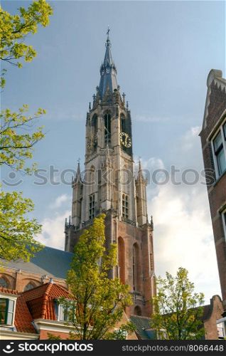 Delft. Old church with a bell tower.. The old medieval church in the market square in Delft. Netherlands.