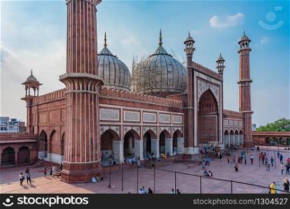 DELHI, INDIA - APRIL 19, 2019: The red Jama Mosque (Masjid Jahan Numa), built in the 17th in Mughal architecture, is one of the largest mosques in India. It has been the site of two terror attacks.