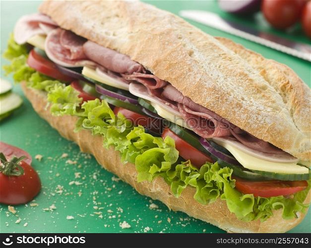 Deli Sub Sandwich on a Chopping Board