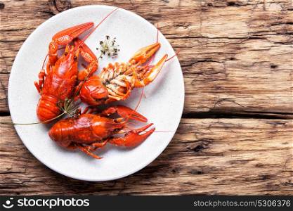 delicacy boiled crawfish. tasty seafood shellfish served on the plate
