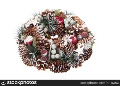 Delicate Christmas wreath of pine cones isolated on a white background