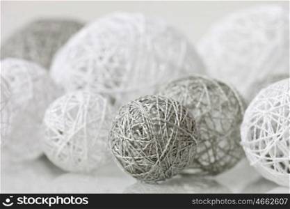 Delicate handmade balls with fine thread for decoration