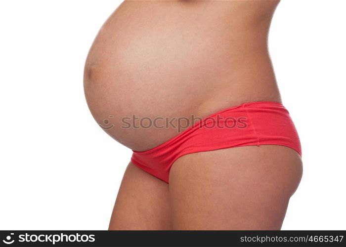 Delicate pose of a pregnant woman with naked torso isolated on a white background