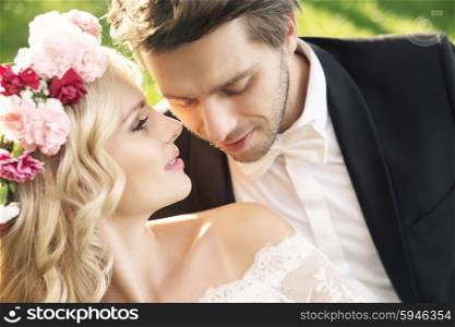 Delicate young bride with handsome groom