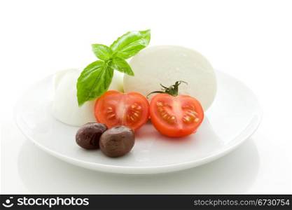 deliciious buffalo mozzarella with cutted cherry tomatoes on white isolated backgroundl