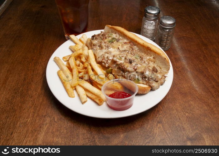 Delicious American cuisine known as the Philly Cheesesteak. Pizza and Beer