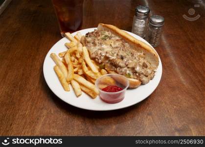 Delicious American cuisine known as the Philly Cheesesteak. Pizza and Beer