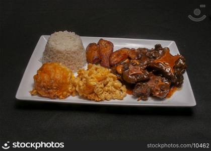 Delicious and authentic caribbean cuisine known as oxtails