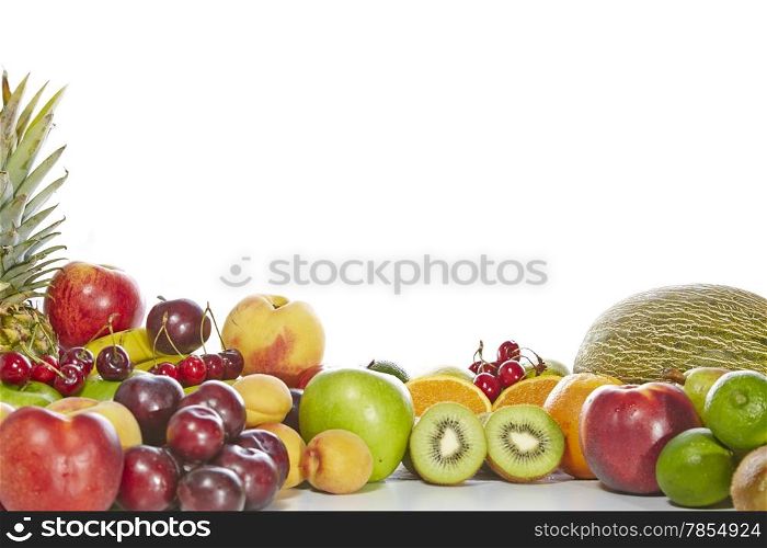 Delicious and healthy fresh fruit on a white background