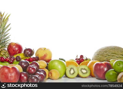 Delicious and healthy fresh fruit on a white background