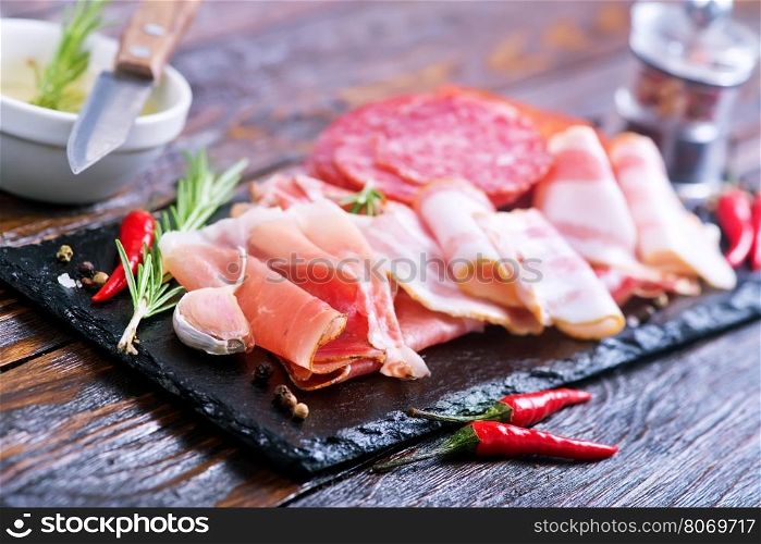 Delicious and tasty meat dishes on the board
