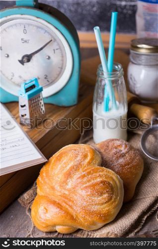 delicious appetizing buns and coffee for breakfast. Homemade bakery