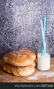 delicious appetizing buns and milk for breakfast
