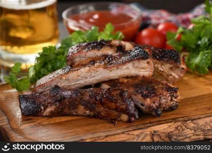 Delicious Baked Grilled Sliced pork belly with barbeque sauce plating on wooden plate,  herbs and vegetables and potatoes