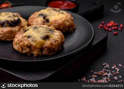 Delicious baked meat boats with mushrooms, cheese, salt and spices on a dark concrete background