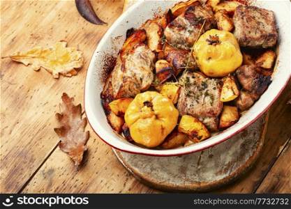 Delicious baked meat with aromatic autumn quince.. Slice pork in quince sauce
