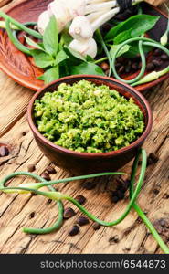 Delicious basil pesto sauce. Homemade italian pesto sauce and ingredients.Italian food