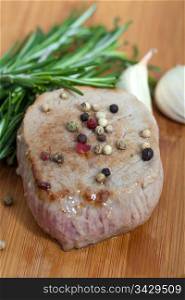Delicious beef with garlic and rosemary