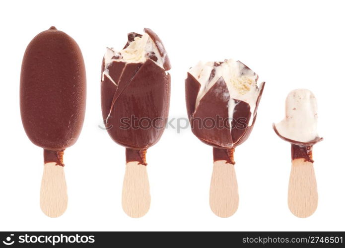 delicious black chocolate ice cream (being eaten up, sequential images) isolated on white background