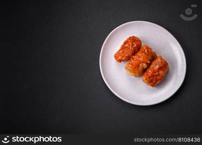 Delicious cabbage rolls with meat, rice, salt, spices and herbs. Traditional dish of Ukrainian cuisine