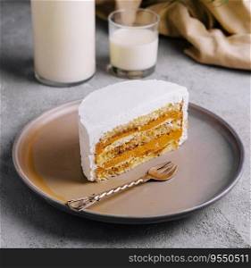 Delicious cake with whipped cream and caramel filling