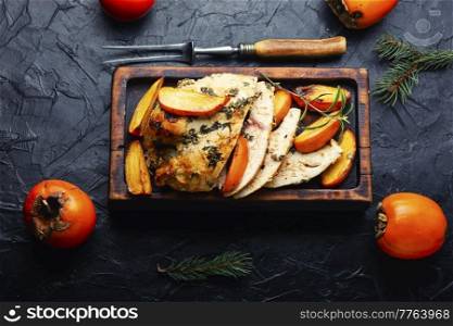 Delicious chicken breast baked with persimmon pieces.. Chicken breast grilled with persimmon