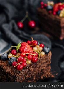 Delicious chocolate cake decorated with fresh berries