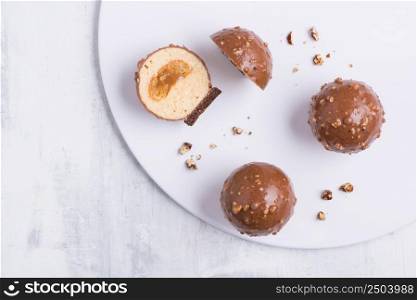 delicious chocolate cake on a white plate. sweets on white background