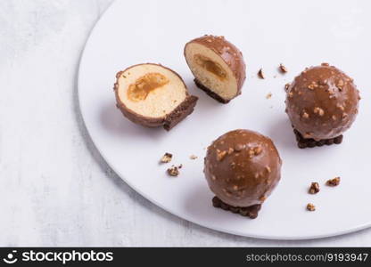 delicious chocolate cake on a white plate. sweets on white background