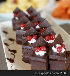 delicious chocolate cake with cherry on top