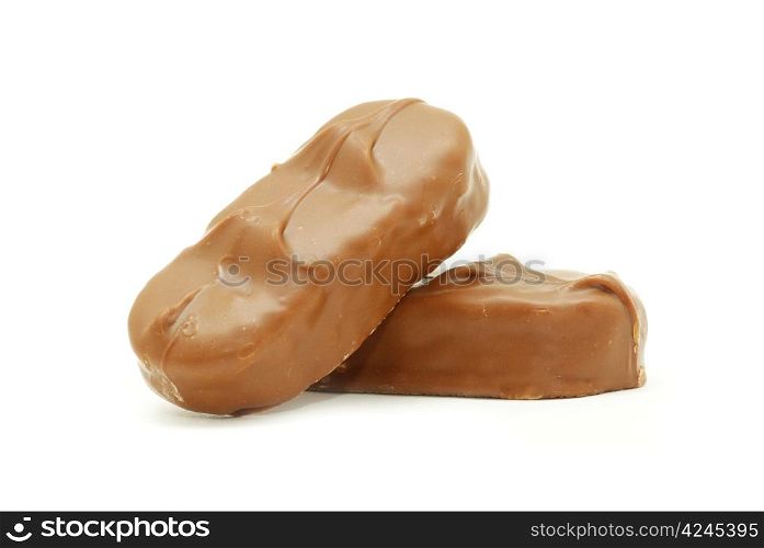 Delicious chocolate confetti isolated on white
