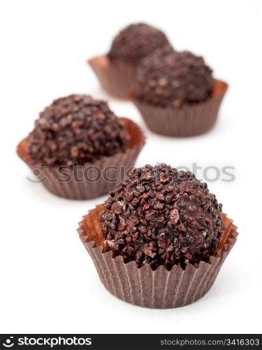 Delicious Chocolate Filled Pralines on White Background