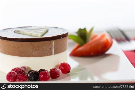 Delicious chocolate mousse with strawberries two flavors