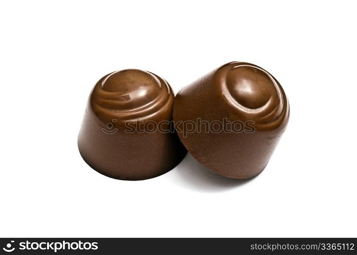 Delicious chocolates isolated on white background
