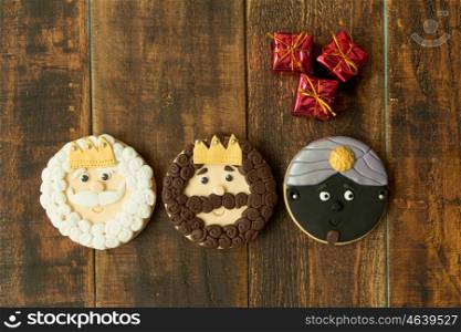 Delicious Christmas cookies a wooden table. Kings mages