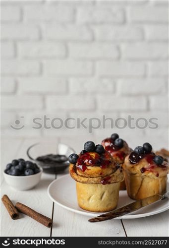 delicious cinnamon rolls with fruit topping