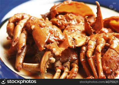 Delicious crabs cooked with spicy sweet and sour sauce