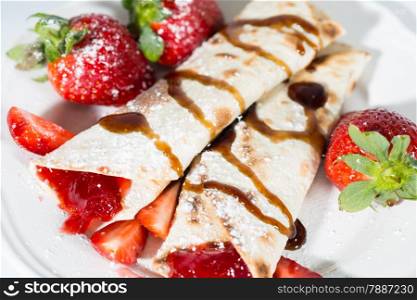 Delicious crepes with strawberry jam fresh candy