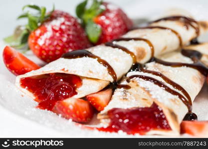 Delicious crepes with strawberry jam fresh candy