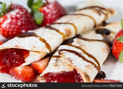 Delicious crepes with strawberry jam fresh candy