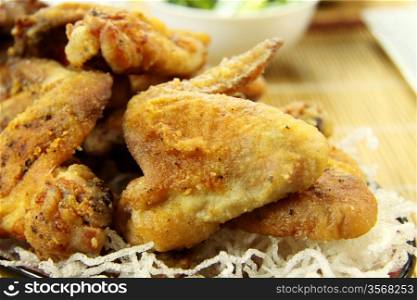 Delicious crumbed chicken wing ready to serve.
