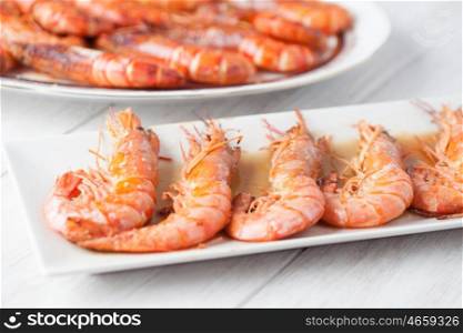 Delicious dish of baked prawns with selective focus