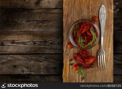 Delicious Dried Tomatoes in a Jar Rustic Style with a space in the for text.